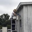 Tom Sawyer Day 2018 01 Docent Leslie Applying the Whitewash to Dampened Boards 