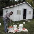 Tom Sawyer Day 2018 01 Jim Mixing the Whitewash Mud with Water